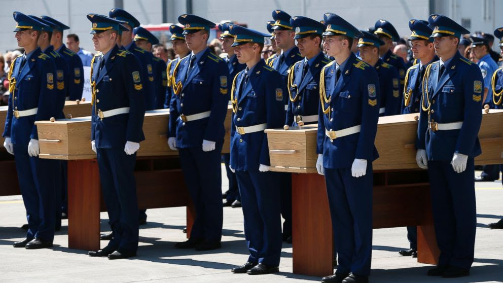 PHOTO: Honor guard members participate in a memorial ceremony for the victims of Malaysia Airlines Flight MH17 at Ukraine’s Kharkiv airport, July 23, 2014.
