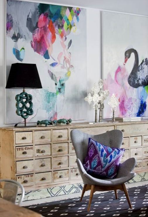 living rooms - art natural wood black beige ikat console fabric drum shade round coffee table rug lamps teal eclectic  Lucy Fenton via DTI