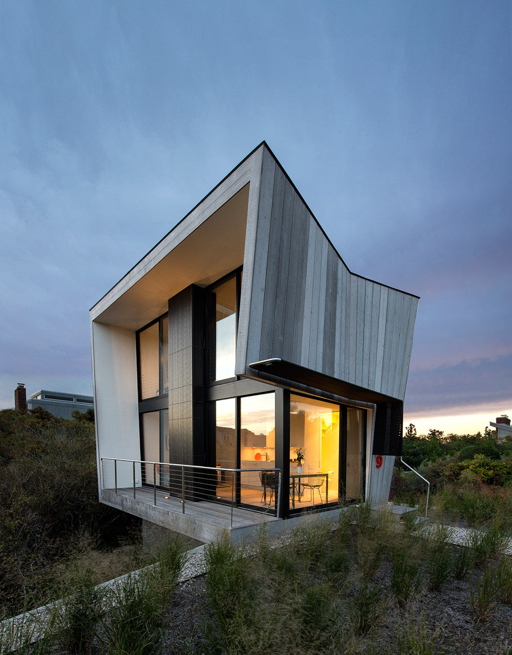 A Two Story Beach House With A Small Footprint Design Milk