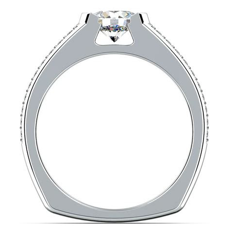 Often we find ourselves following traditions without actually knowing where these traditions started and why we take part in them. Pave Diamond Euro Shank Engagement Ring in Platinum
