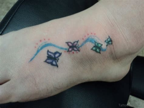 superb butterfly  star tattoos  feet