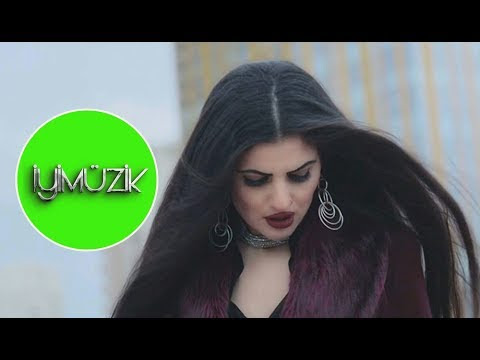 Tutuldum Şarkı Sözleri - Emel