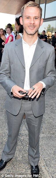 Suited and booted: Dominic Monaghan looked smart in a grey suit and white shirt