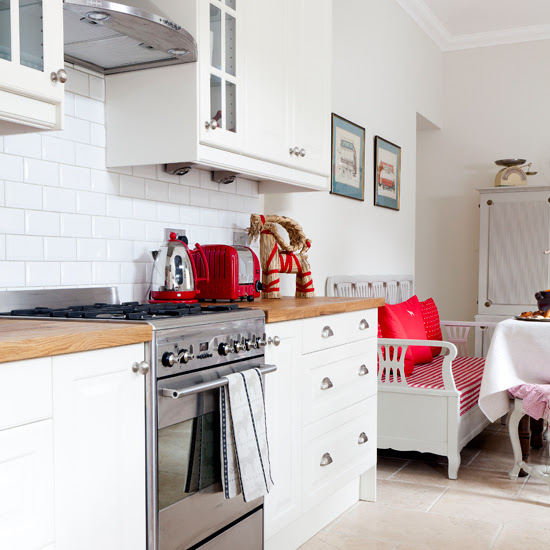 Modern white kitchen with red accessories | housetohome.co.uk