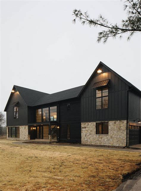 What colors would be best for this square stucco home with craftsman details? Sherwin Williams Iron Ore Black House Exterior Paint Color