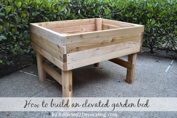 So let me show you how to build an elevated raised bed garden table!