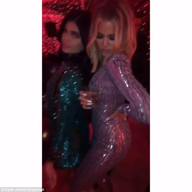 Having a ball: The two hit the dance floor in their glittering getups