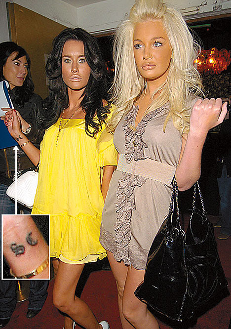 Jasmine now sports a rather fetching tattoo with the initials SC, inset