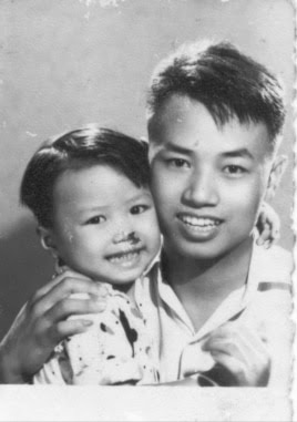 FILE - Hai Do is shown with his father, Hoe Do.