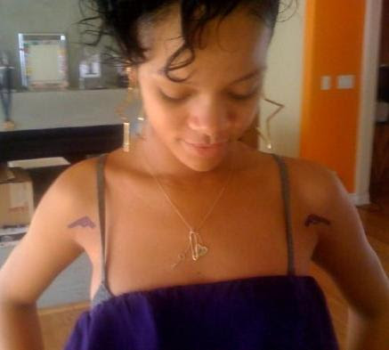 The 'razzi got shot of Chris Brown's new tattoo as he was catching his