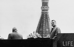 Gamal Abdul Nasser (R) and Soviet Nikita A. Khrushchev (L) atop building during parade celebration. May 1958ç