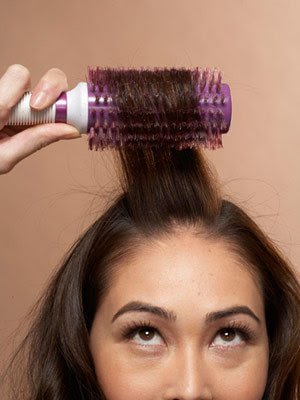 model brushing hair