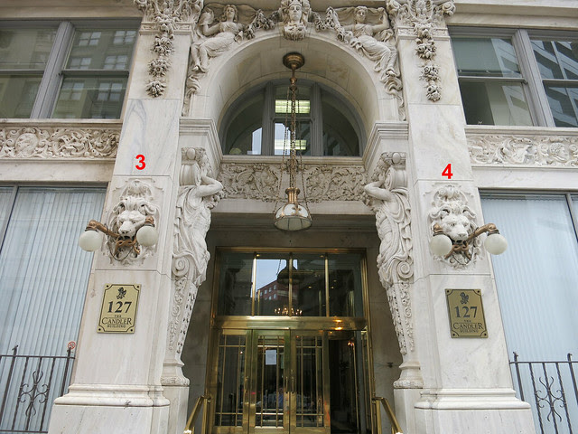IMG_3555-2013-08-14-Candler-Building-Lions-West-door-count-3-to-4