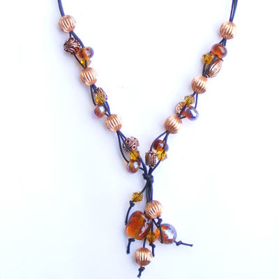 Shiney reduced lampwork beads and copper necklace