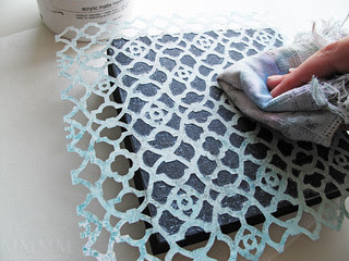 4 lay your Silhouette cut paper onto the wooden canvas & press into the matte medium with a rag (this also helps remove excess matte medium