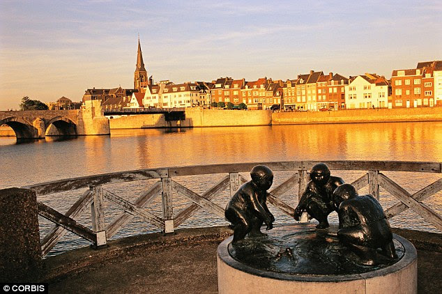 Andre's home town may be in the Netherlands, but it borders Belgium and Germany. Pictured: the Meuse River