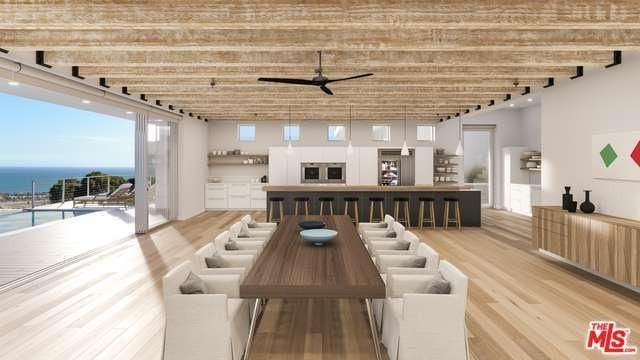 There's also a custom 12-foot hand-hewn teak dining table that seats the entire extended family 