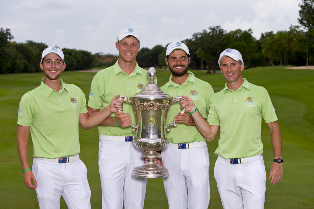 Australian World Amateur Team members: Harrison Endycott, (left), Cameron Davis, Curtis Luck and captain Matt Cutler hoist the trophy at the 18th green, at the conclusion of the fourth round of the 2016 Eisenhower Trophy at El Camaleon G.C. in Riviera Maya, on Saturday, Sept. 24, 2016.  (Copyright USGA/Steven Gibbons)