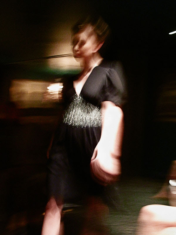 Gossip Couture Launch , Black V neck silk dress with silver mesh waist.