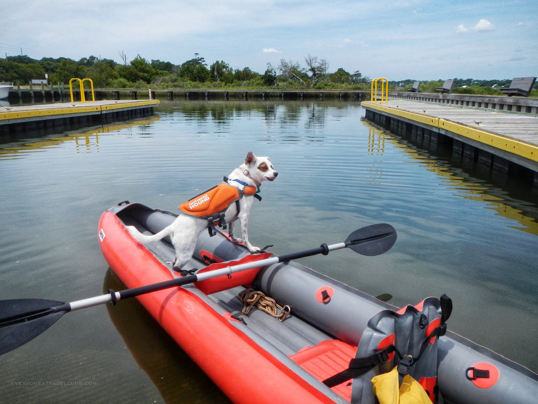 Launching a kayak from the Emerald Isle Town Boat Ramp - EVERYONE'S TRAVEL  CLUB
