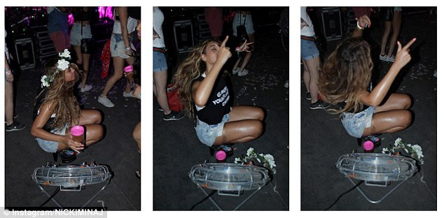 Party time: The singer brought it low as she danced