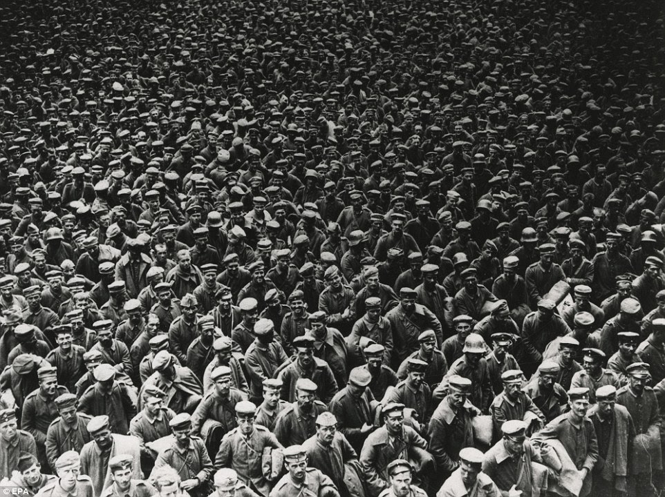epa04298301 A handout picture provided by the Multimedia Art Museum, Moscow (MAMM) press service in Moscow, Russia on 04 July 2014, shows an old photograph entitled 'Prisoners of the British Army. 1918' by an unknown identity, from a private collection from France. MAMM is presenting multimedia project 'The War That Ended Peace' organized together with major international museums, state archives and private collectors of Russia, France and Italy to mark the 100th anniversary of the First World War. The exhibition runs from 04 July to 19 October 2014.  EPA/PRIVATE COLLECTION, FRANCE / HANDOUT EDITORIAL USE ONLY IN CONNECTION TO THE REPORTING ON THE STORY= HANDOUT EDITORIAL USE ONLY/NO SALES