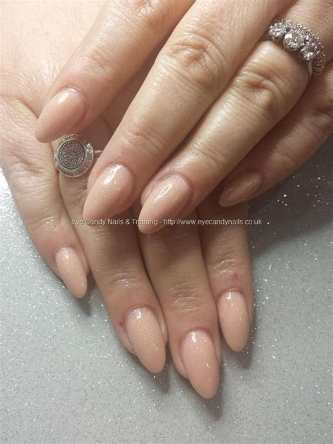 nude acrylic almond shaped nails beauty ndd tips