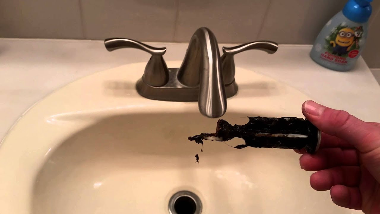 How to remove bathroom sink plug