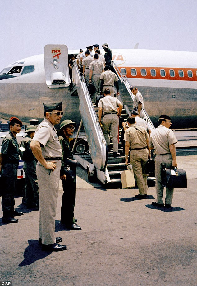 . Lines of bored soldiers snaked through customs and briefing rooms