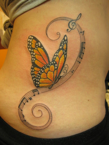 cute BUTTERFLY TATTOO combinated with musical note DESIGNS