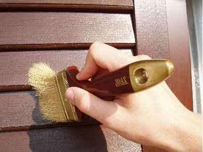 Cómo pintar una casa de madera con un tratamiento integral