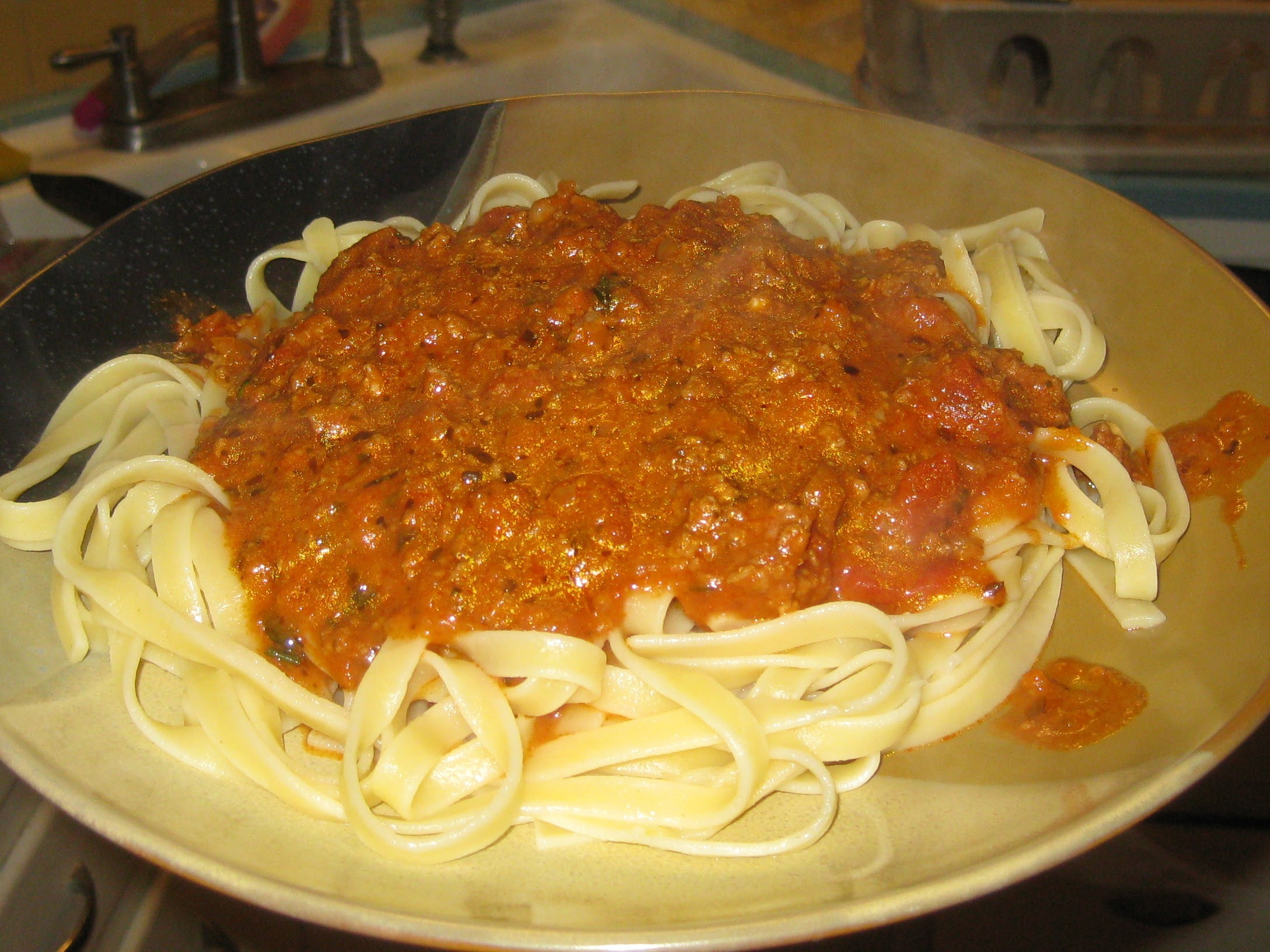 Ground Beef And Sausage With Pasta In Tomato Cream Sauce