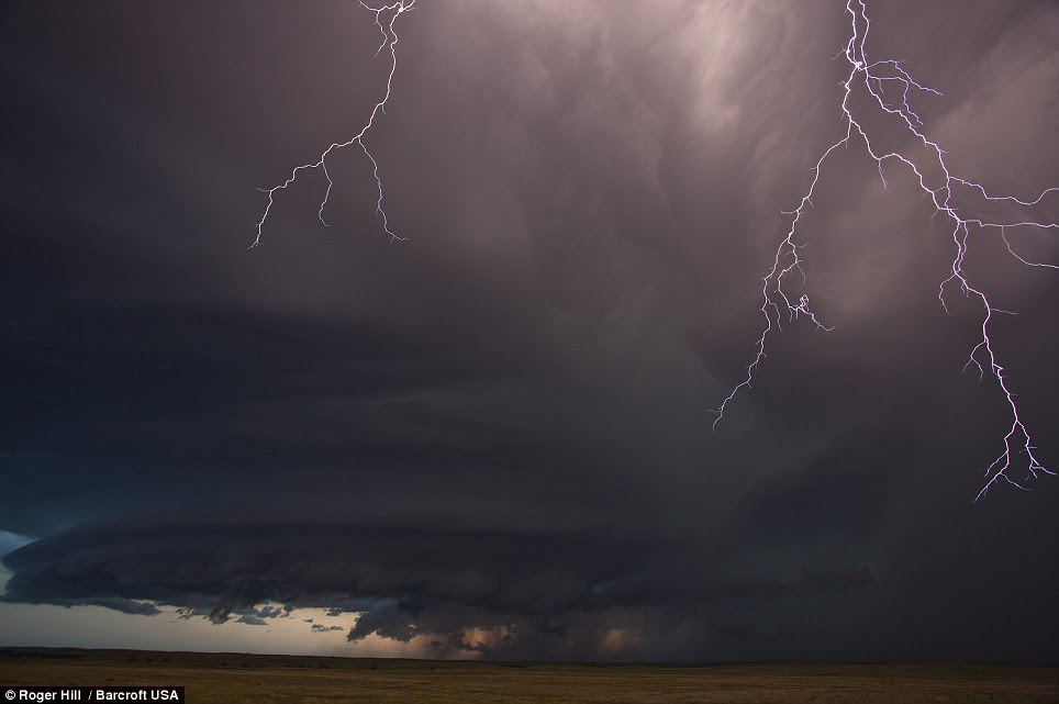 Stay away: Mr Hill said storms like this one in South Dakota leave 'debris everywhere' and animal bodies all over the road