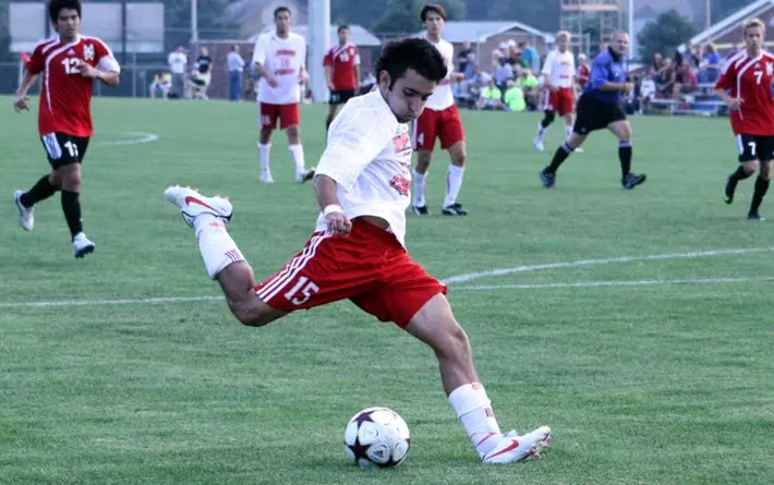 soccer dude kicks the ball!