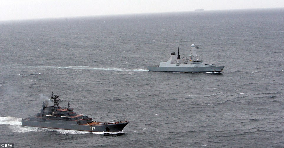 HMS Dragon (right) with the Russian Ropucha Class Landing Ship 'Minsk' (left), in the English Channel