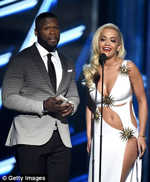 Coordinated display: Ora's white gown was perfectly matched to 50's ombré blazer