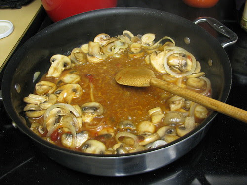 chicken broth and tomato paste in