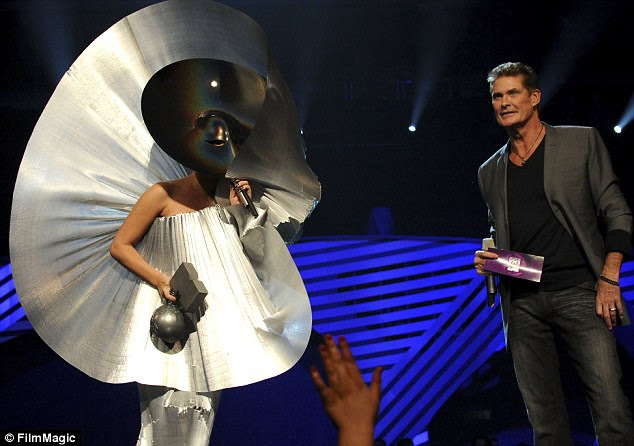 Cheeky! Gaga complimented David Hassellhoff on his manhood as she accepted the award for Best Female 