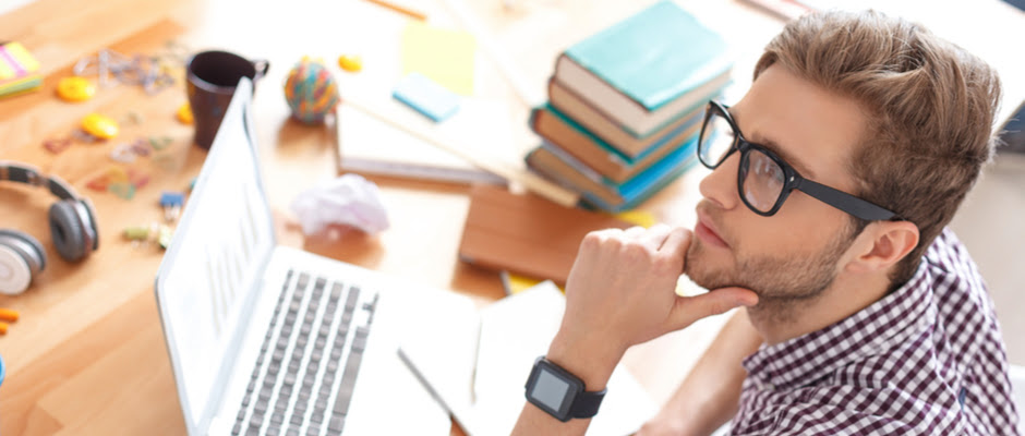 A man studying new freelance skills while sitting at a desk