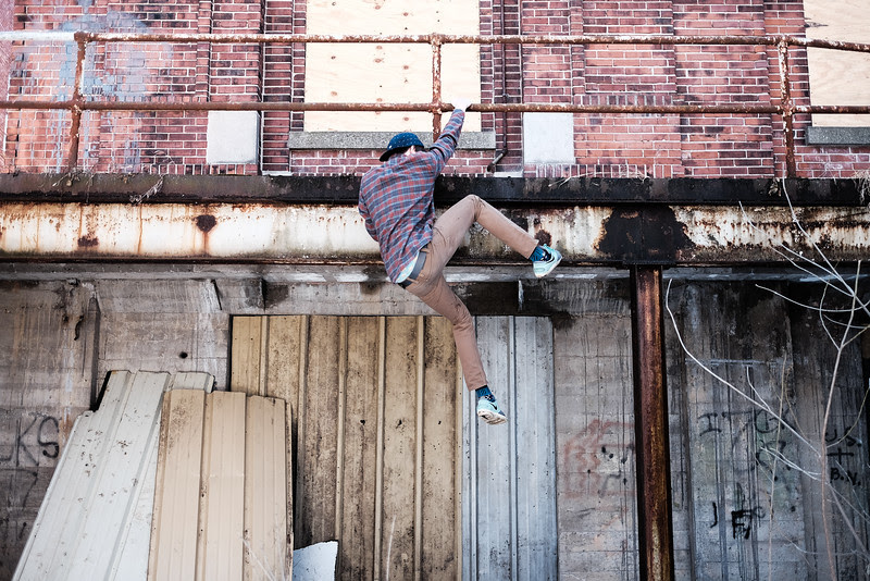 Jake's downtown Rockford senior  portrait shoot, featuring aggressive in-line skating photos, skateboarding lifestyle, and even a unicycle.