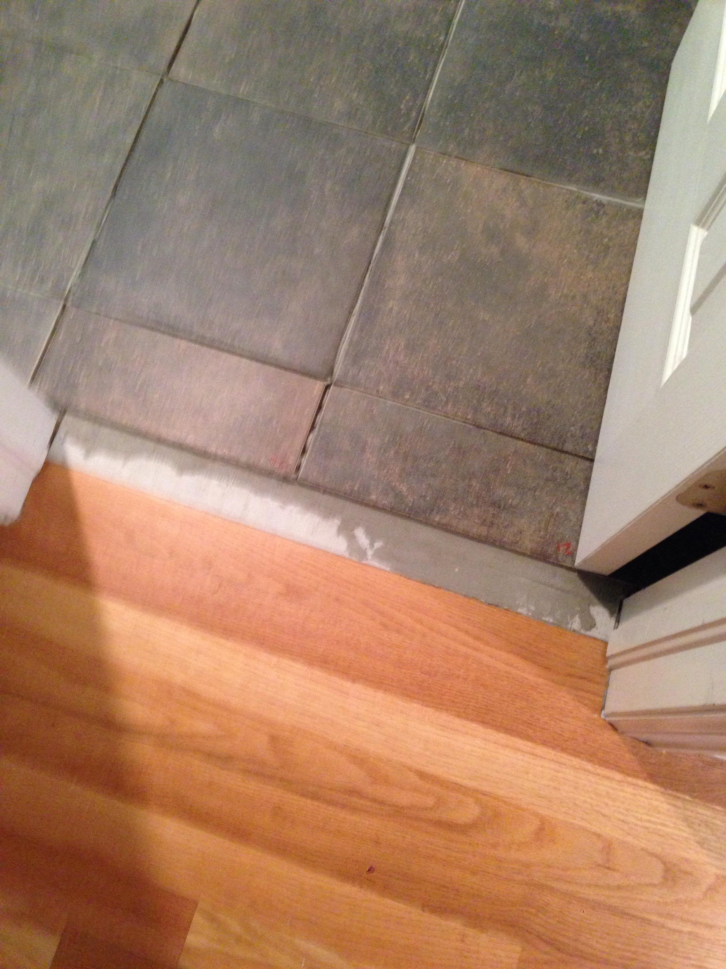 Wood tile transition - Looking for ideas on transition from tile to woodDIY