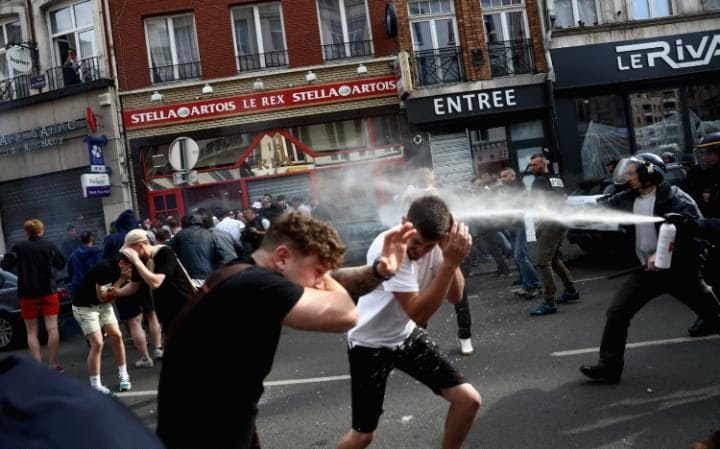 English fans run into a barrage of pepper spray