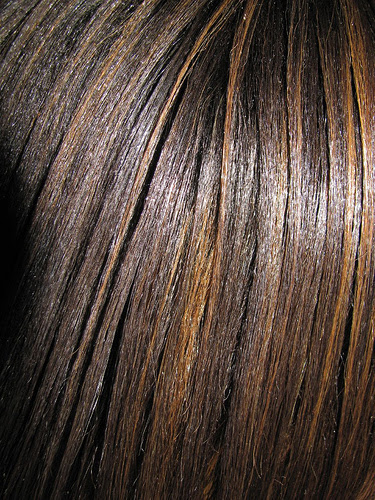 I have black hair with some light brown highlights.