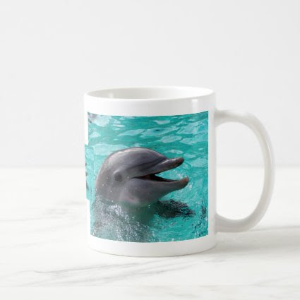 Dolphin head in aquamarine water mugs
