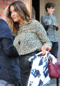 Lisa Snowdon black mini skirt London