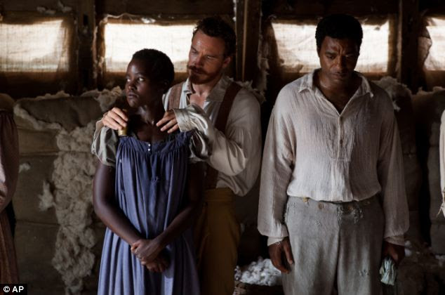International acclaim: Chiwetel left acting school during his first year to take up a role in Steven Speilberg's film Amistad. He has starred in Love Actually and Kinky Boots. But it was his role in 12 Years A Slave, alongside Lupita Nyong'o (left) and Micahel Fassbender (second left), that has won the actor international acclaim