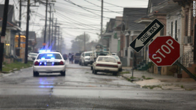 A stop sign stands askew in New Orleans after being blown by Isaac.