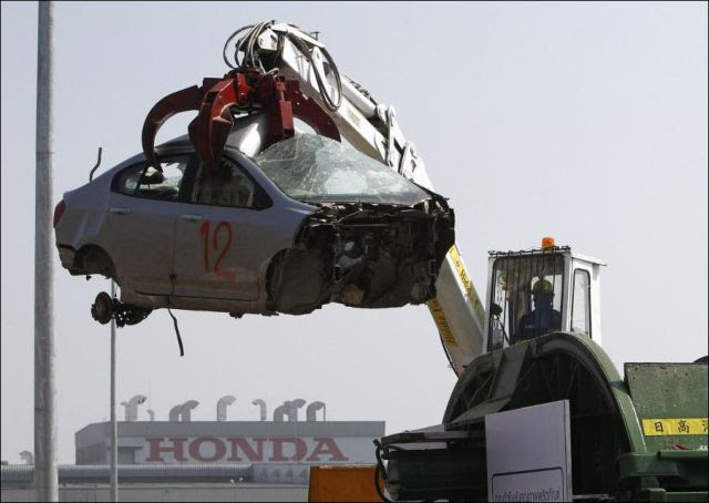Honda Destroys Flooded Cars
