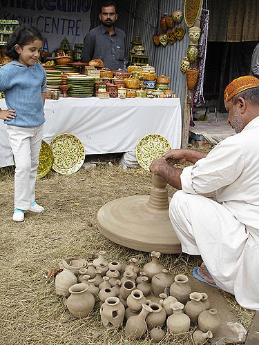 Pottery in Action by go2net.