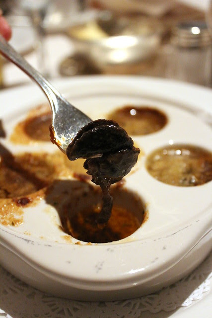 Escargots Bourguigon glazed with shallot, parsley and garlic butter